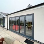 a bungalow in Keyworth featuring new windows, doors, a bi-fold door and a bi-fold window fitted by Acorn Windows