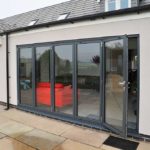 a bungalow in Keyworth featuring new windows, doors, a bi-fold door and a bi-fold window fitted by Acorn Windows