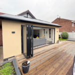 Home extension with bi-fold door and atrium roof
