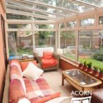 A Lean To Conservatory in Beeston, Nottingham, with a glass roof in a cream PVCu.